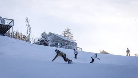 Snowboarders on western